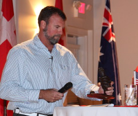 Jonathan Poole accepting the sculpture.
